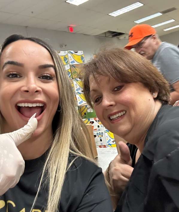 Two smiling women